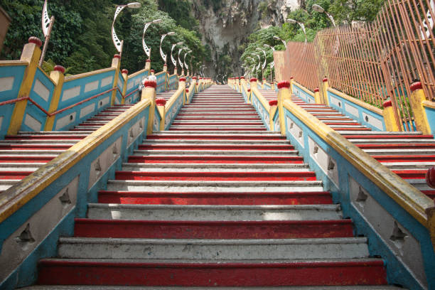 istock Steep yellow, blue and red step leading upward. 1221531290
