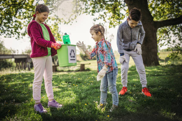 istock Family cleaning up the forest 1221533662