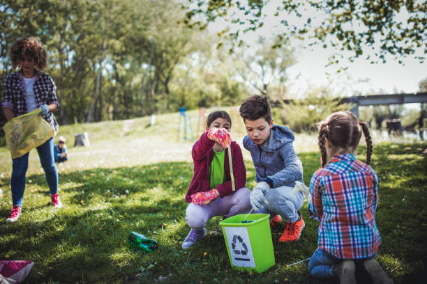 istock Family cleaning up the forest 1221533870