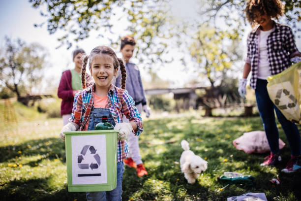 istock Family cleaning up the forest 1221534595