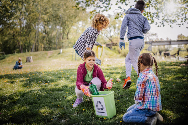 istock Family cleaning up the forest 1221534597