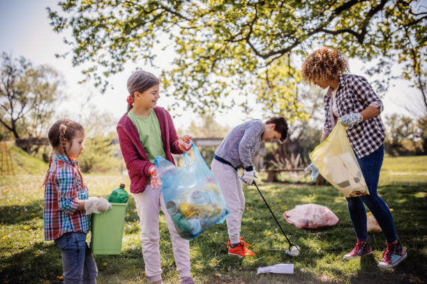 istock Family cleaning up the forest 1221534833