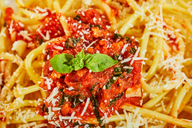 istock Tasty appetizing classic italian pasta spaghetti with tomato sauce 1221536672