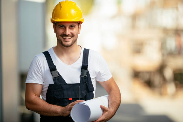 istock Young handsome man working in factory. 1221536711
