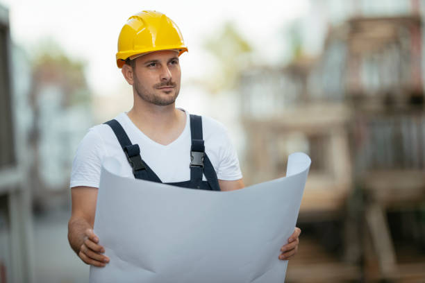 istock Young handsome man working in factory. 1221536763