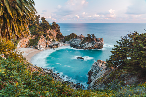 This wide angle shot was shot just as the sun was setting on the McWay Falls in Big, Sur, California.