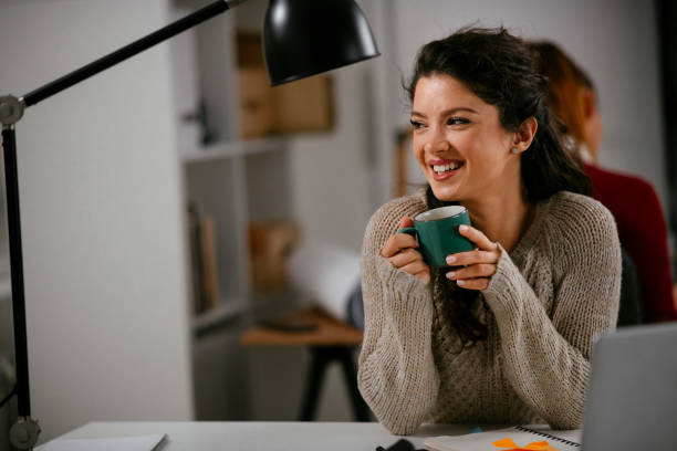 istock Beautiful businesswoman working on lap top. 1221537902