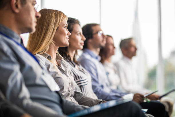 istock Business people in a line on a training class in the office. 1221537918