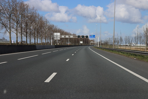 Almost empty motorway A12 at Zevenhuizen due to the corona virus lockdown in the Netherlands