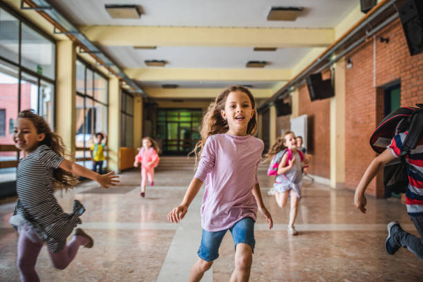 istock We have to run or we are going to be late to class! 1221539893