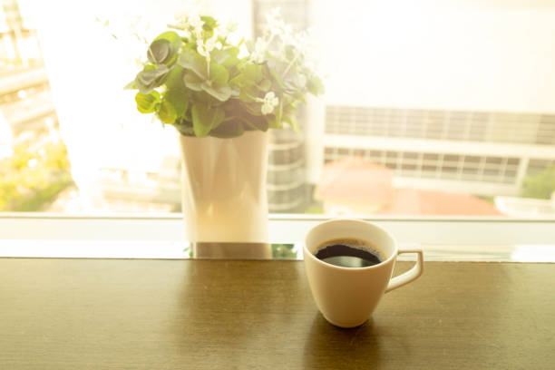 istock Coffee cup on office desk at home. workplace in home office. Work from home concept. 1221542117