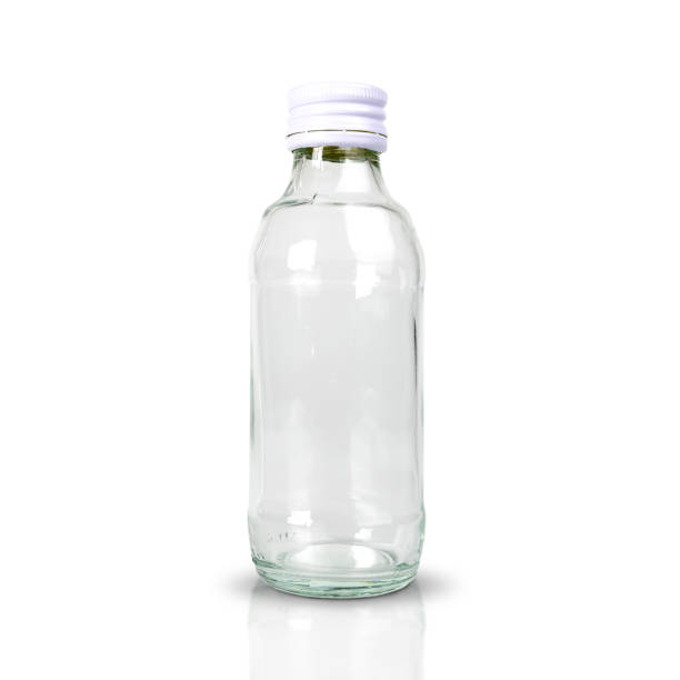 istock Clear glass bottle with white screw cap isolated on white background. with clipping paths. 1221542229