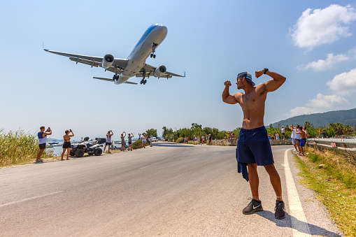 Skiathos, Greece – August 2, 2019: TUI Boeing 757-200 airplane at Skiathos airport (JSI) in Greece. Boeing is an American aircraft manufacturer headquartered in Chicago.