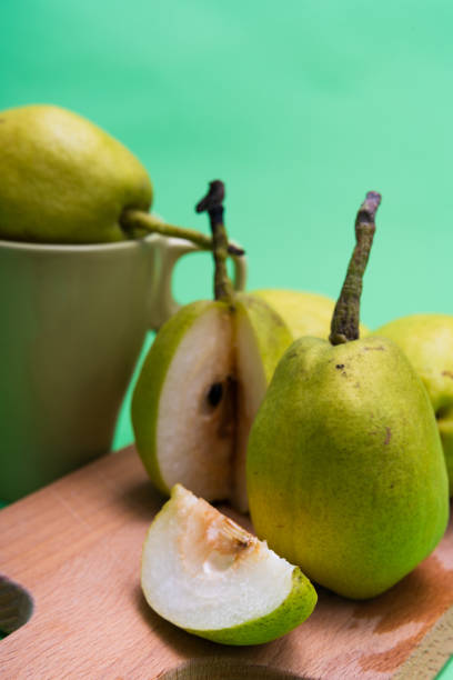 istock Korla fragrant pear on green background 1221546753