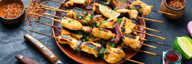 istock Grilled meat on skewers 1221546993