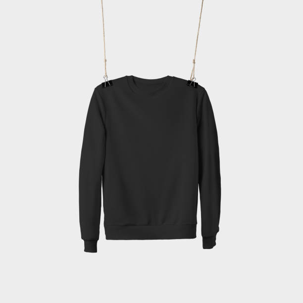 istock Template of a black pullover suspended from ropes, empty clothes for presentation of design and pattern. 1221548488