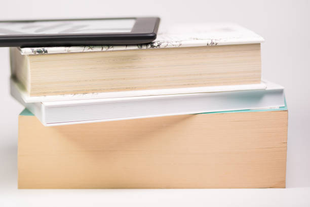 istock Online reading of books. A reader for books. Online library 1221549964