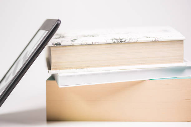 istock Online reading of books. A reader for books. Online library 1221550038