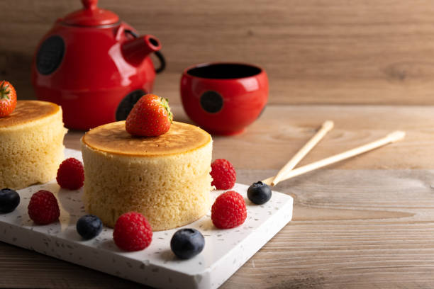 trendy asian food, fluffy homemade japanese souffle pancakes, hotcakes with raspberry, blackberry with copy space. - japanese maple imagens e fotografias de stock