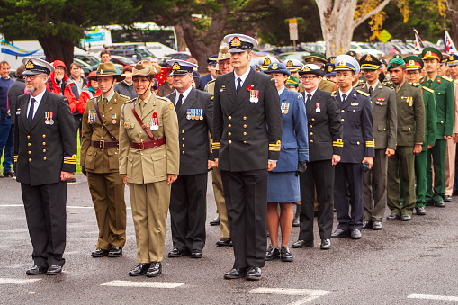 Inverleigh, Victoria 25th April 2015: Men and women of the Australian Defence Force (Army, Navy and Air Force) and foreign military students from the Defence International Military Training Centre (DInTC) in uniform take part in the ANZAC Day service and march.