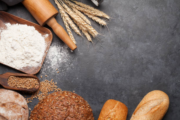 istock Various bread with wheat, flour and cooking utensils 1221552299