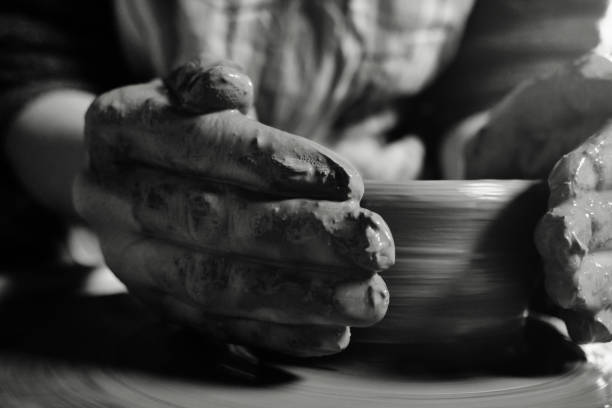 istock In a creative laboratory, a ceramist is creating a home-made jars and artwork 1221552656
