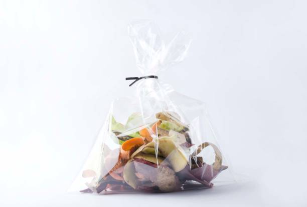 istock Packaging of organic vegetable peelings to compost.Eco bags, biodegradable concept 1221555962