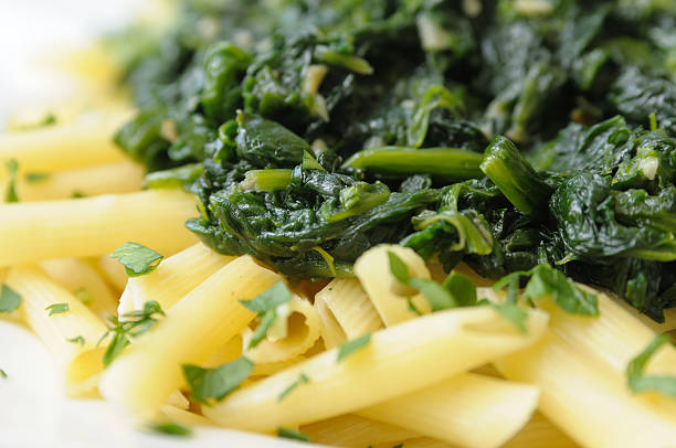 Spinach  spinach pasta stock pictures, royalty-free photos & images