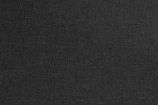 Textura de tela gris negro para el fondo y el diseño de arte de trabajo con patrón sin costuras de textil natural. photo