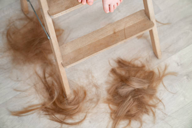 istock Hair falling on flour after cutting hair. 1221562734