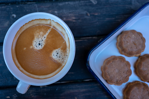 home baked cocoa cookie and coffee break