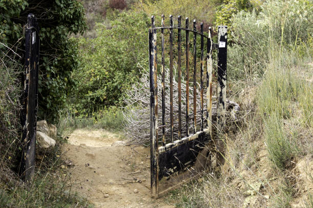 Old abandoned metal fence, detail of abandoned architecture, ruin