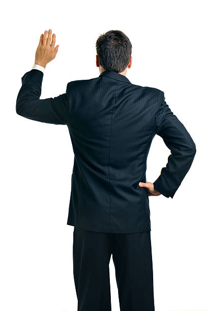 istock Businessman raising Hand from behind on white 122156779