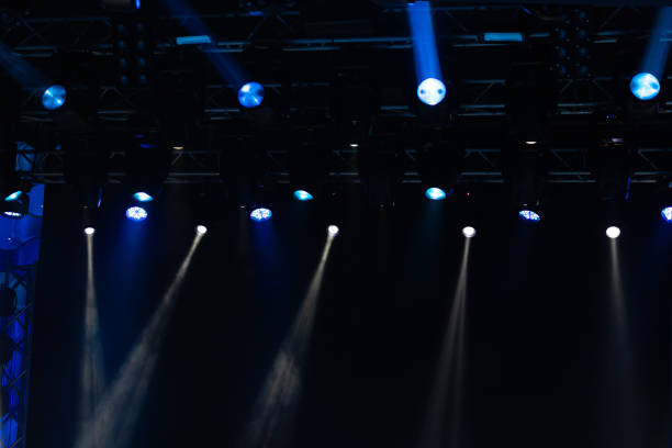 istock lights spotlights and smoke over the stage 1221568066
