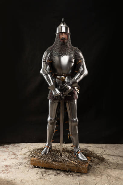 istock Mannequin man with a beard in a helmet and armor of a knight 1221568710
