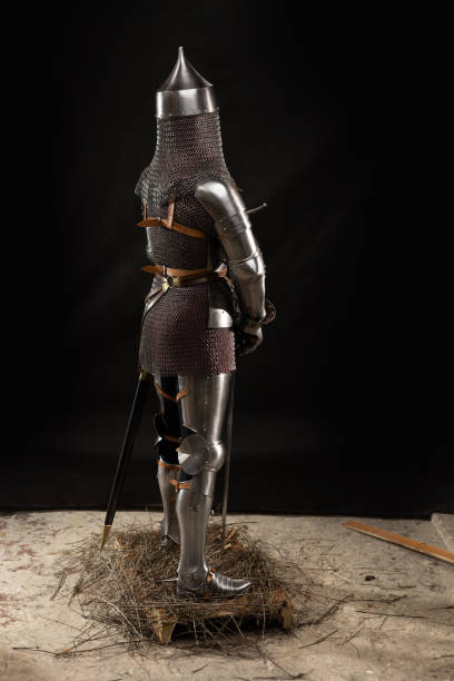 istock Mannequin man with a beard in a helmet and armor of a knight 1221568893