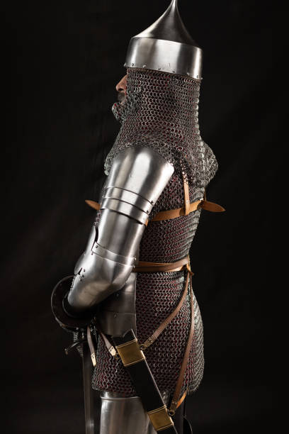 istock Mannequin man with a beard in a helmet and armor of a knight 1221568971