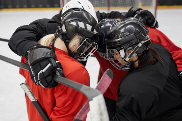 istock Hockey Team Huddling 1221570557