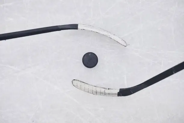 Above view background of two hockey clubs ready to start match on skating rink, copy space