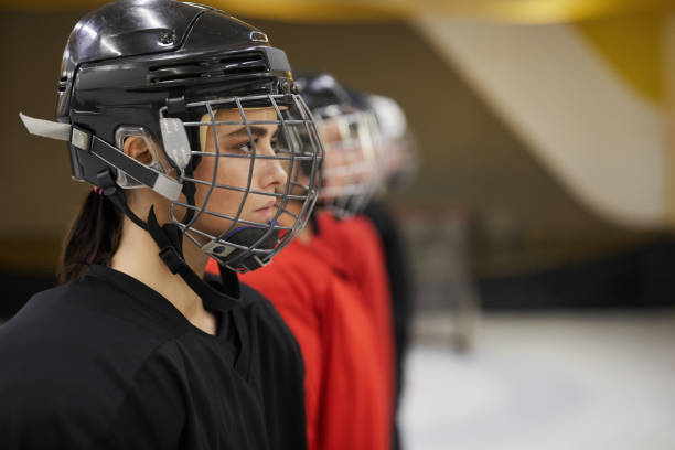 istock Female Hockey Team in Row 1221570598
