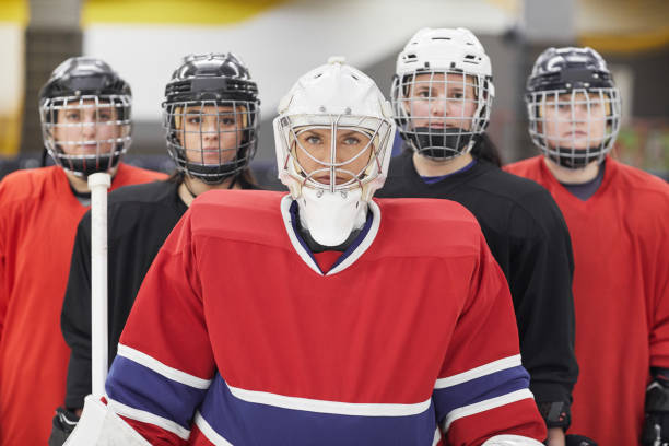 istock All Female Hockey Team Posing 1221570629