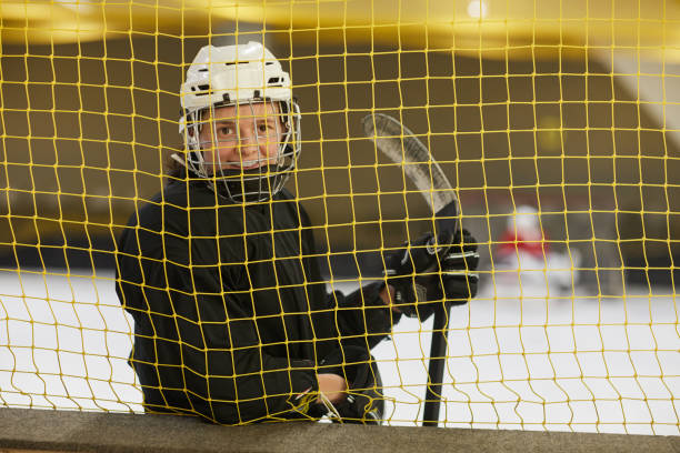 istock Female Hockey Player Smiling 1221570633