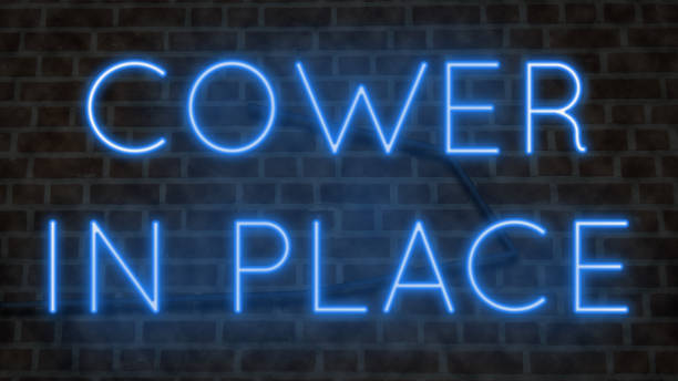 istock Neon sign COWER IN PLACE 1221574110