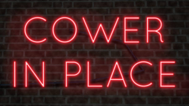 istock Neon sign COWER IN PLACE 1221574126