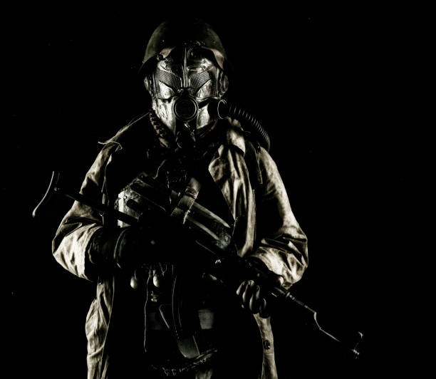 istock Post apocalyptic soldier aiming firearm weapon 1221577323