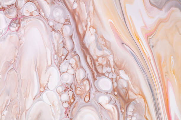 istock Fluid art texture. Abstract backdrop with mixing paint effect. Liquid acrylic artwork with chaotic mixed paints. Can be used for posters or wallpapers. Brown, orange and white overflowing colors. 1221577543