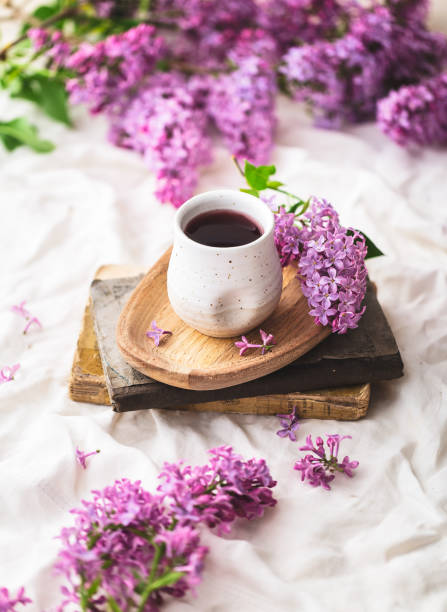 istock House Interior with a Lilas Bouquet, Books, TeaCup 1221577574