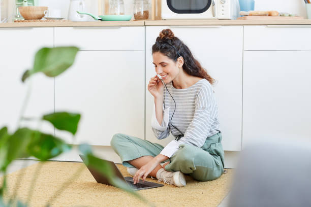 istock Relaxed Woman with Laptop 1221577771