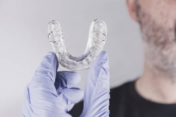 istock Dental splint and man 1221581060