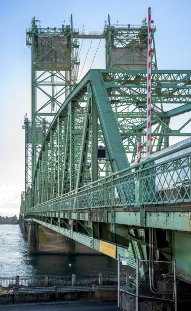 istock Columbia River Interstate Bridge transport and pedestrian drawbridge with towers and counterweights and with separate traffic flows in Portland 1221582290